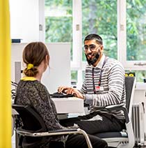 Student optician with a client