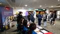 A group of prospective students at the accommodation zone talking to the Accommodation Team.