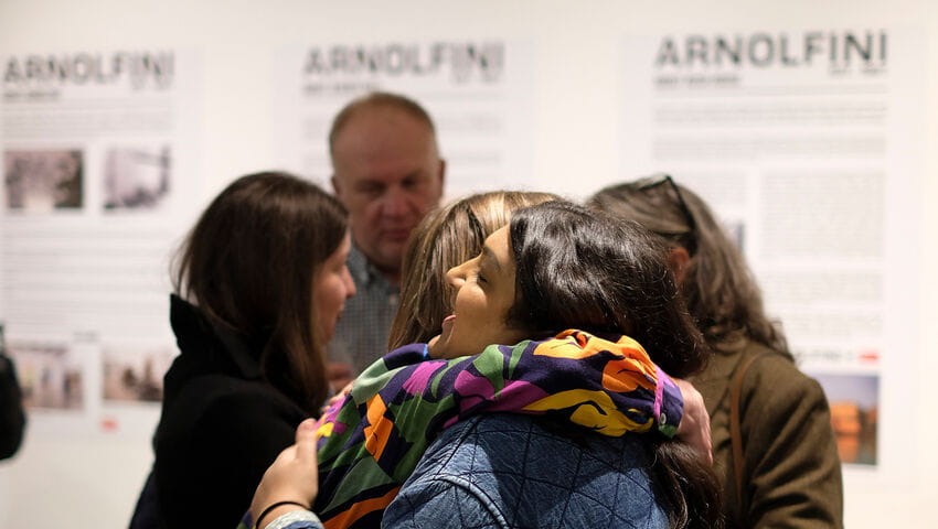 Two women hugging.